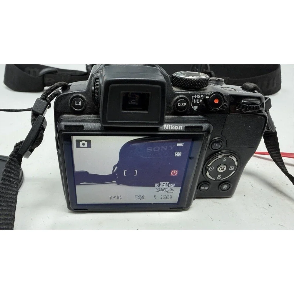 Nikon COOLPIX P500 36X Zoom 12.1MP Tilt Screen Digital Camera - Bundle - Nice